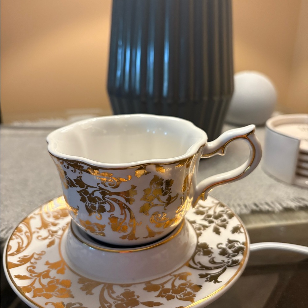 SCENTSY teacup and saucer element warmer. No bulb needed. Like new only used a c